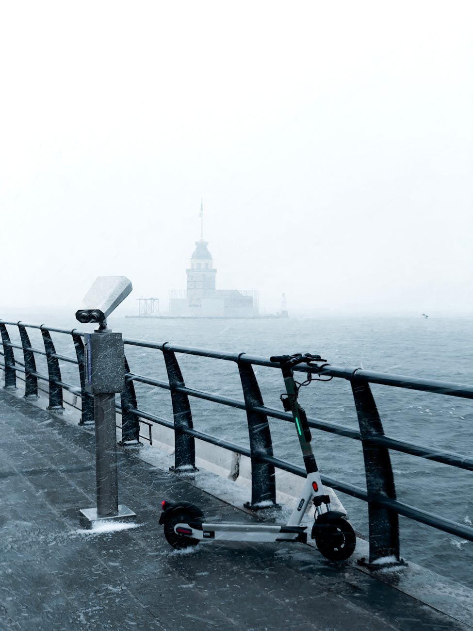 electric scooter standing on a promenade